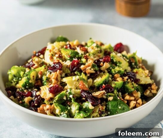 Delicious Brussels Sprouts Cranberry Walnut Salad, perfectly dressed and ready to serve.