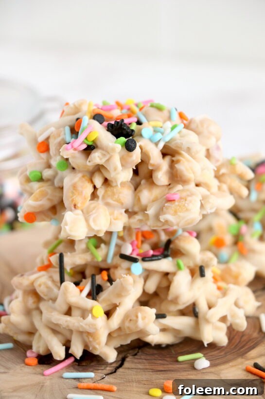 Finished White Chocolate Halloween Crock Pot Candy with festive sprinkles, ready to be served.