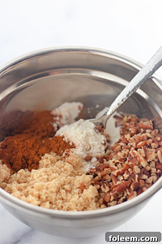 Mixing the dry ingredients needed to make the Honey Bun Cake recipe for the holidays