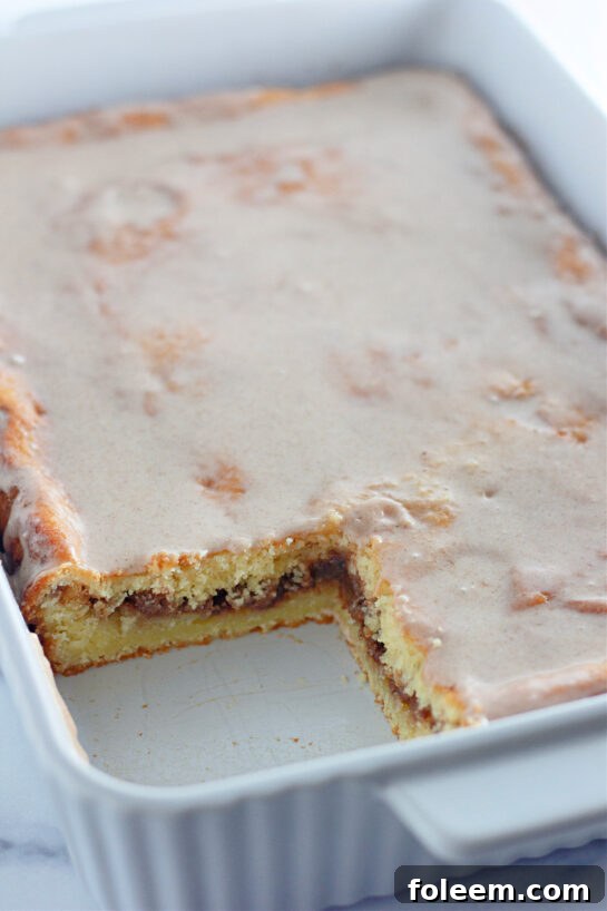 Cut-open photo of Honey Bun Cake recipe to show the inside of the cake.