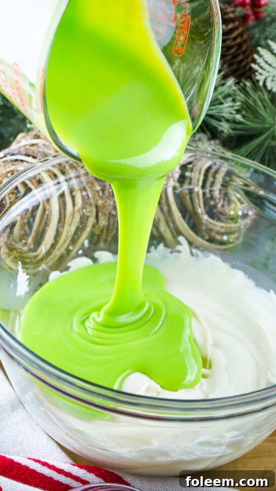 Pouring the mixture ready to be made into Grinch Fudge recipe