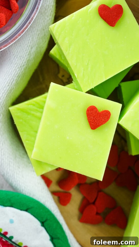 Close-up photo of the finished Grinch Fudge recipe with the heart sprinkles