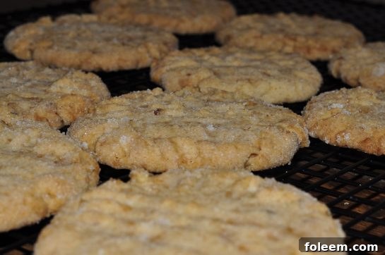 Toffee Almond Sandies are a classic dessert treat made with sweet, crunchy toffee bits that everyone will go crazy for over the holidays. Add them to your Christmas cookie trays!