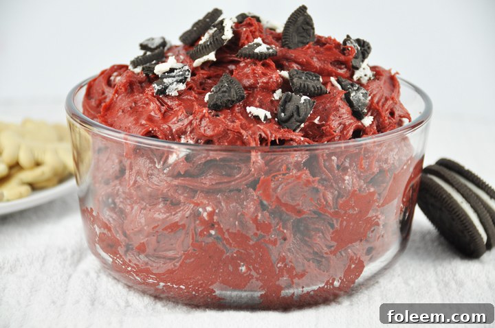 Delicious Red Velvet Oreo Cookie Dip ready for dipping, perfect for holiday gatherings or Valentine's Day.