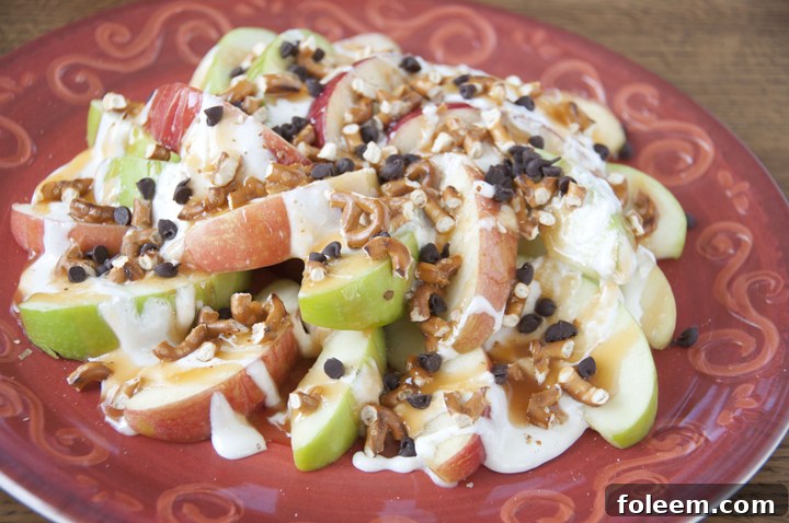 Sweet and Salty Apple Nachos Recipe. If you love caramel apples, you will love these nachos for snack or dessert.