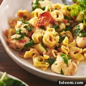 Tuscan chicken tortellini in bowl.