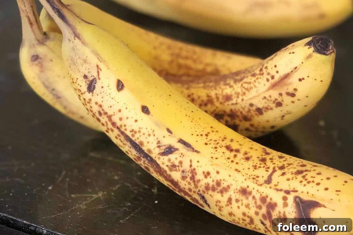 Rip bananas on table.