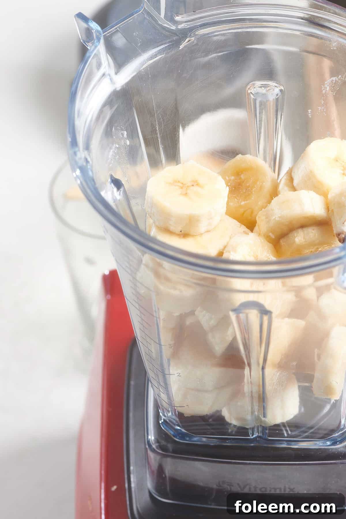 Sliced bananas in blender.