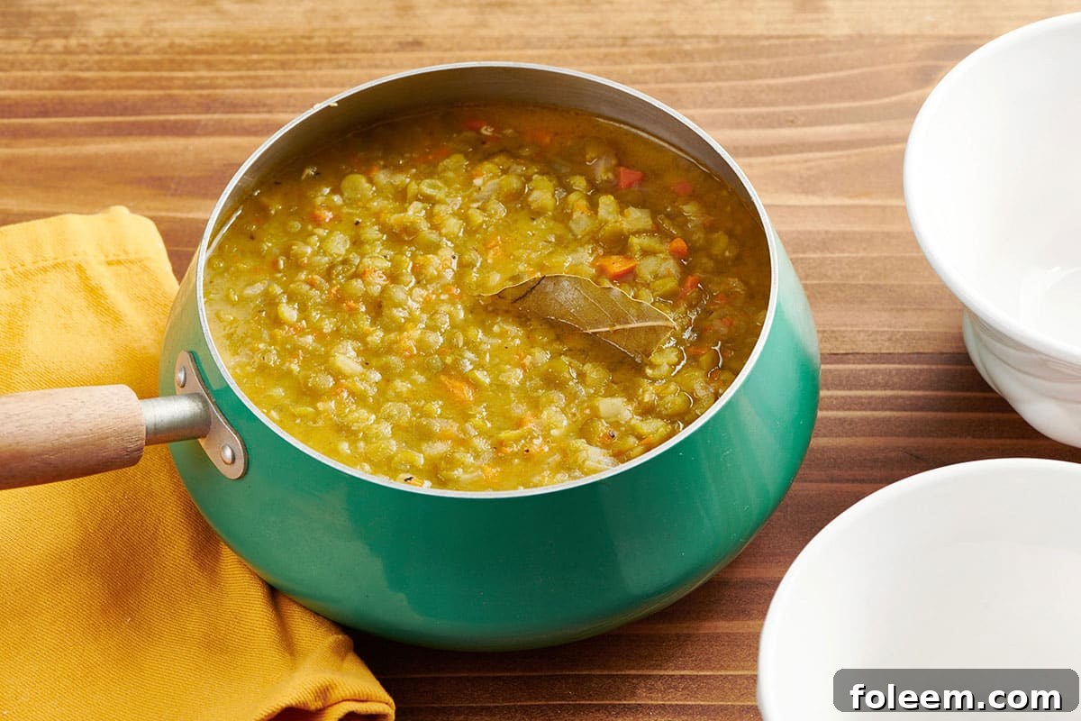 Vegetarian split pea soup in turquoise pot.