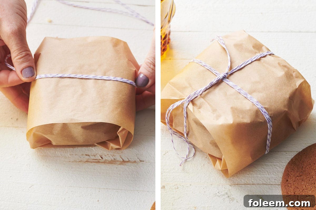 Woman tying twine around Gingersnaps in parchment paper.