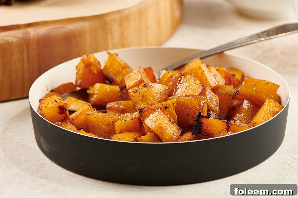 Maple Roasted Butternut Squash in dish on table.