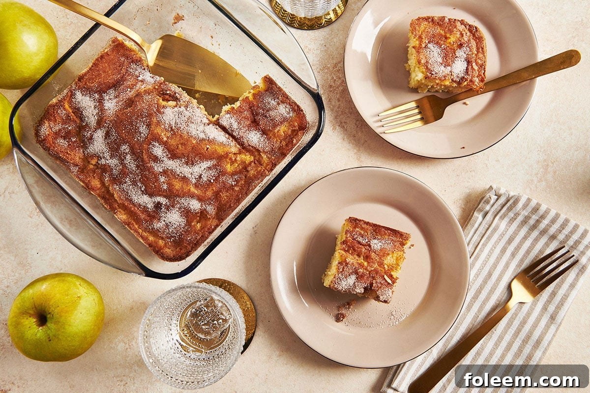 Slices of Apple Coffee Cake on small plates.