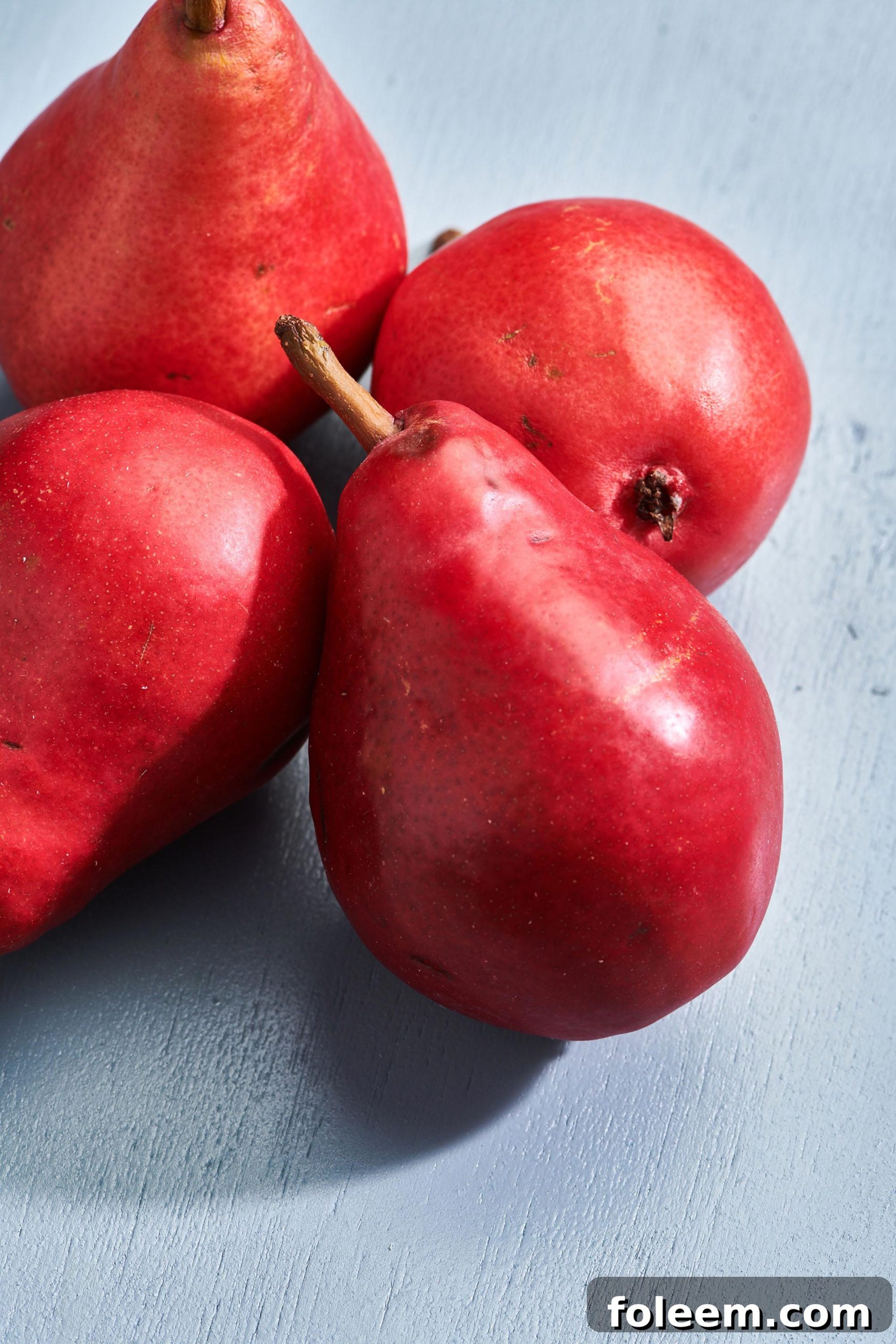 Red pears on a curface.