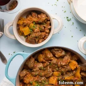 Moroccan Lamb and Butternut Squash Stew in a pot and a bowl.