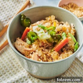 Salmon takikomi gohan in grey bowls