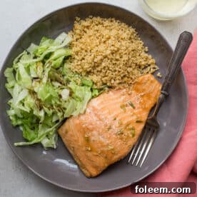 Hoisin glazed salmon with quinoa and salad.