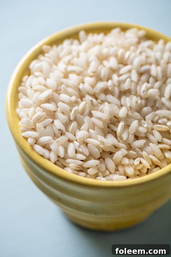 Uncooked Rice in a yellow bowl.