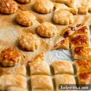 Puff pastry croutons on baking sheet.