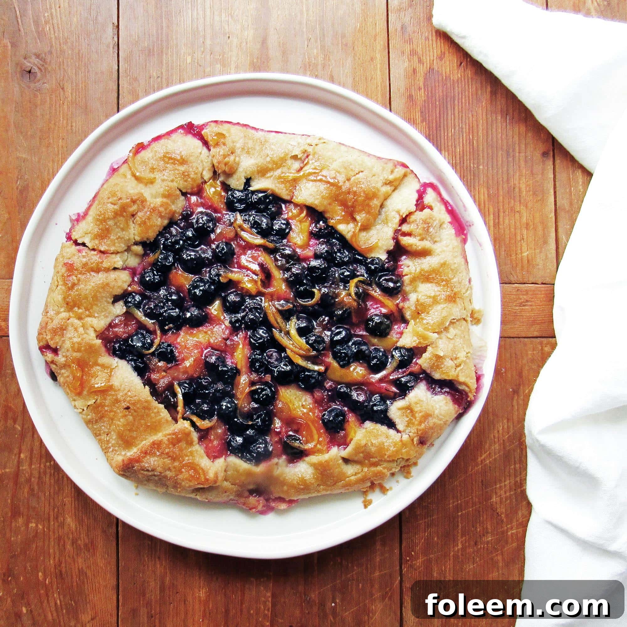 Fruit galette on a plate.