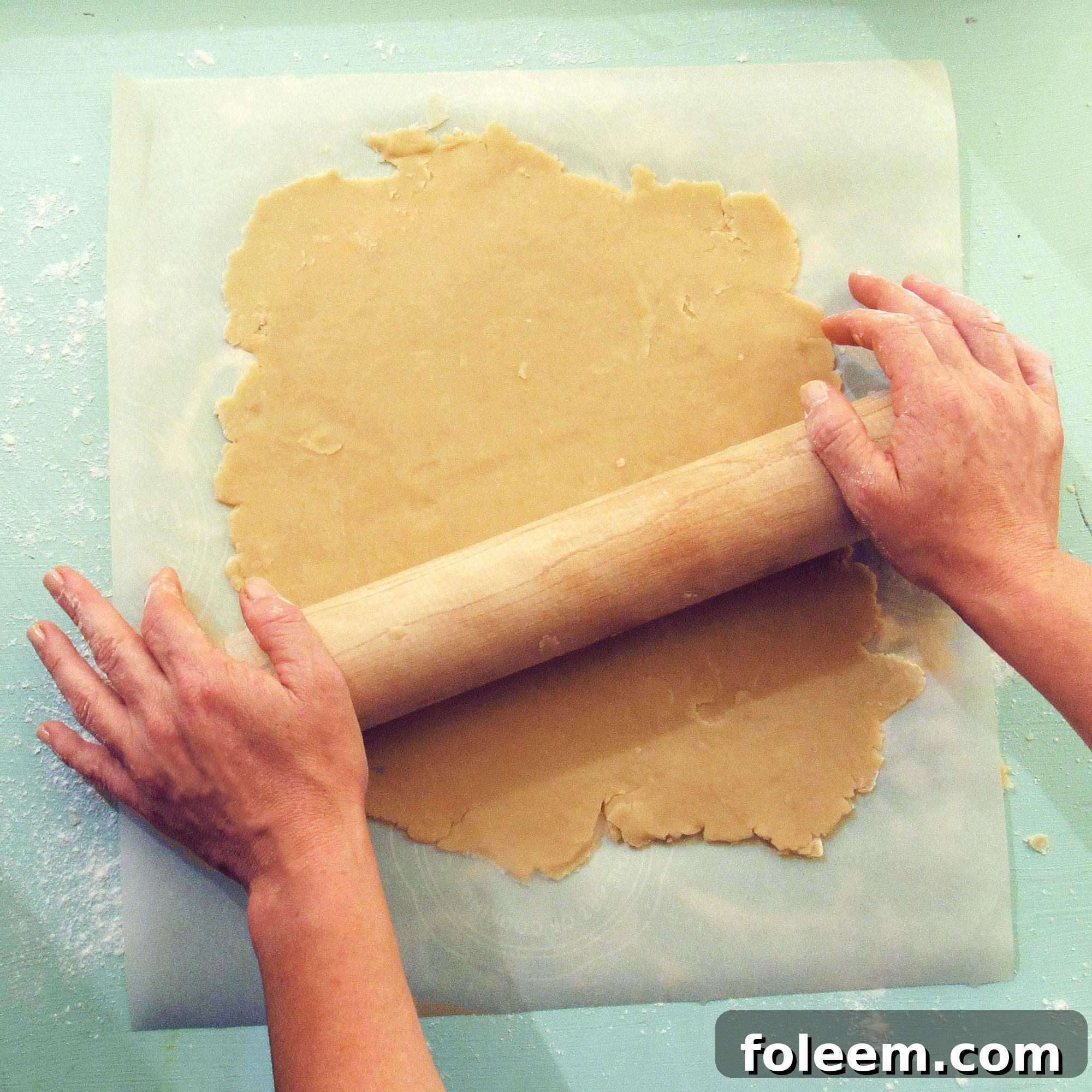 Rolling dough for a galette or crostata.