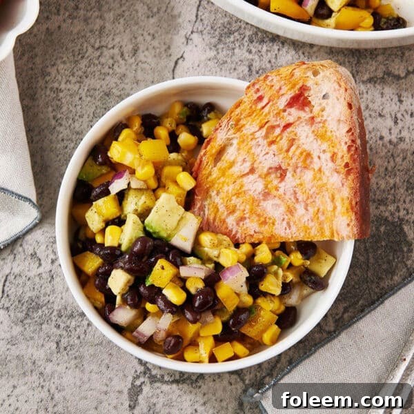 Southwest Black Bean and Corn Salad with Spanish Tomato Bread in bowl.