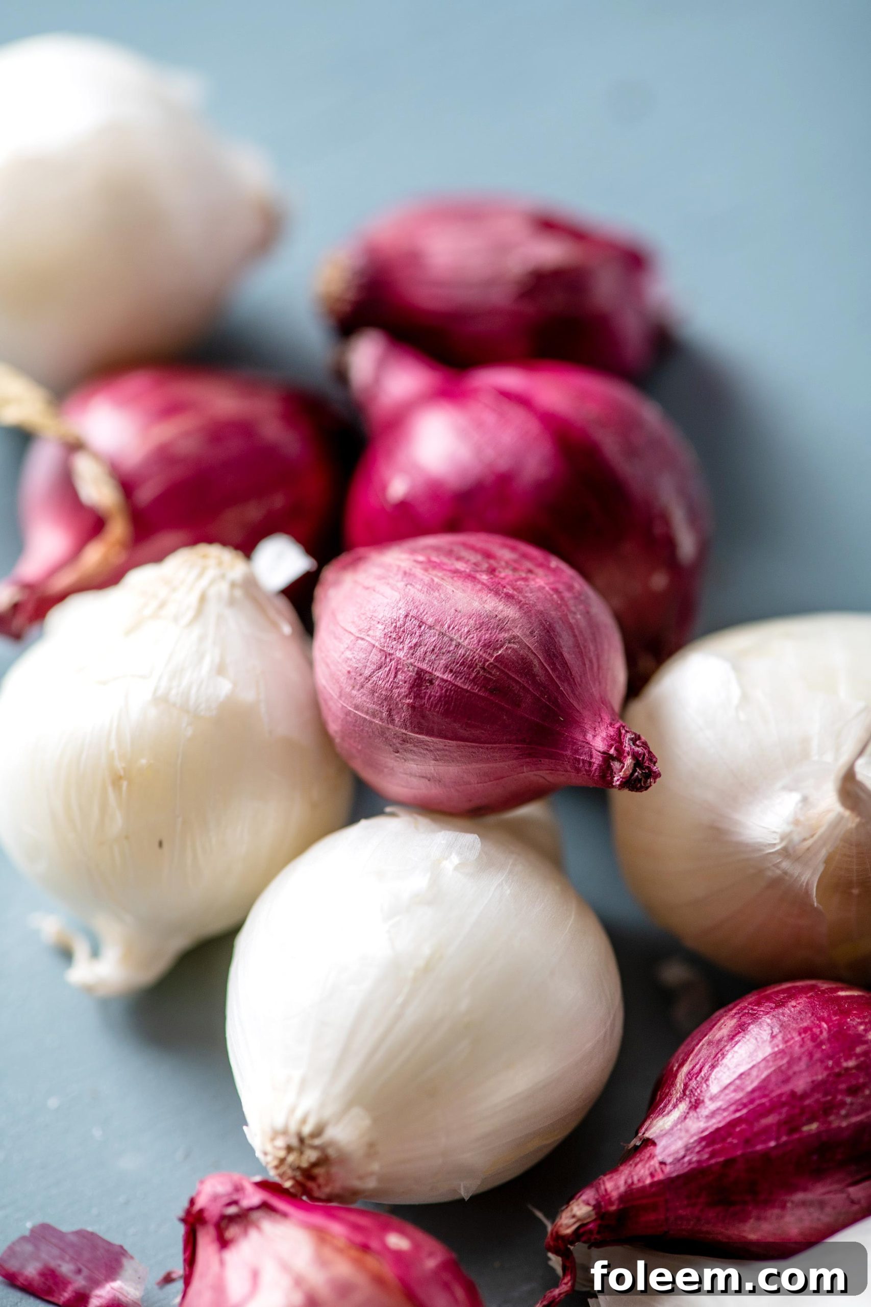 Pile of red and white pearl onions.