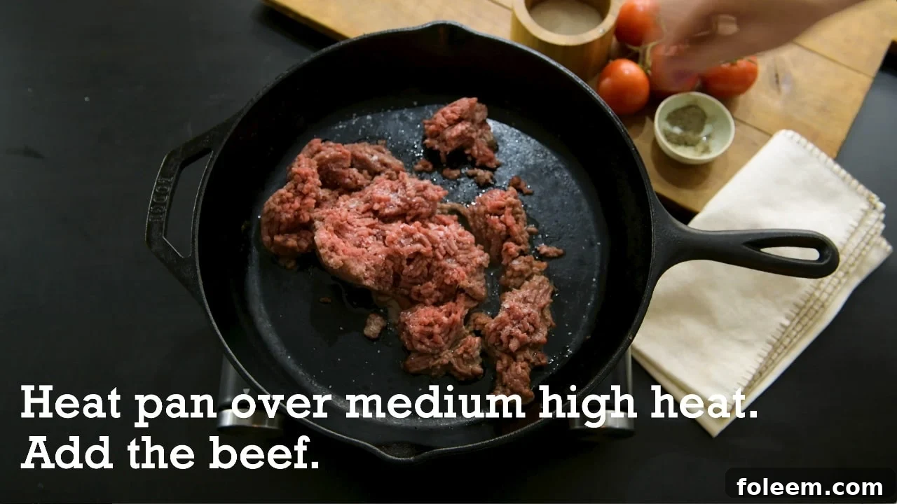 Heat pan over medium high heat and add the ground beef.