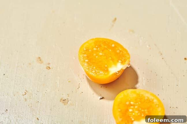 Golden berry cut in half.