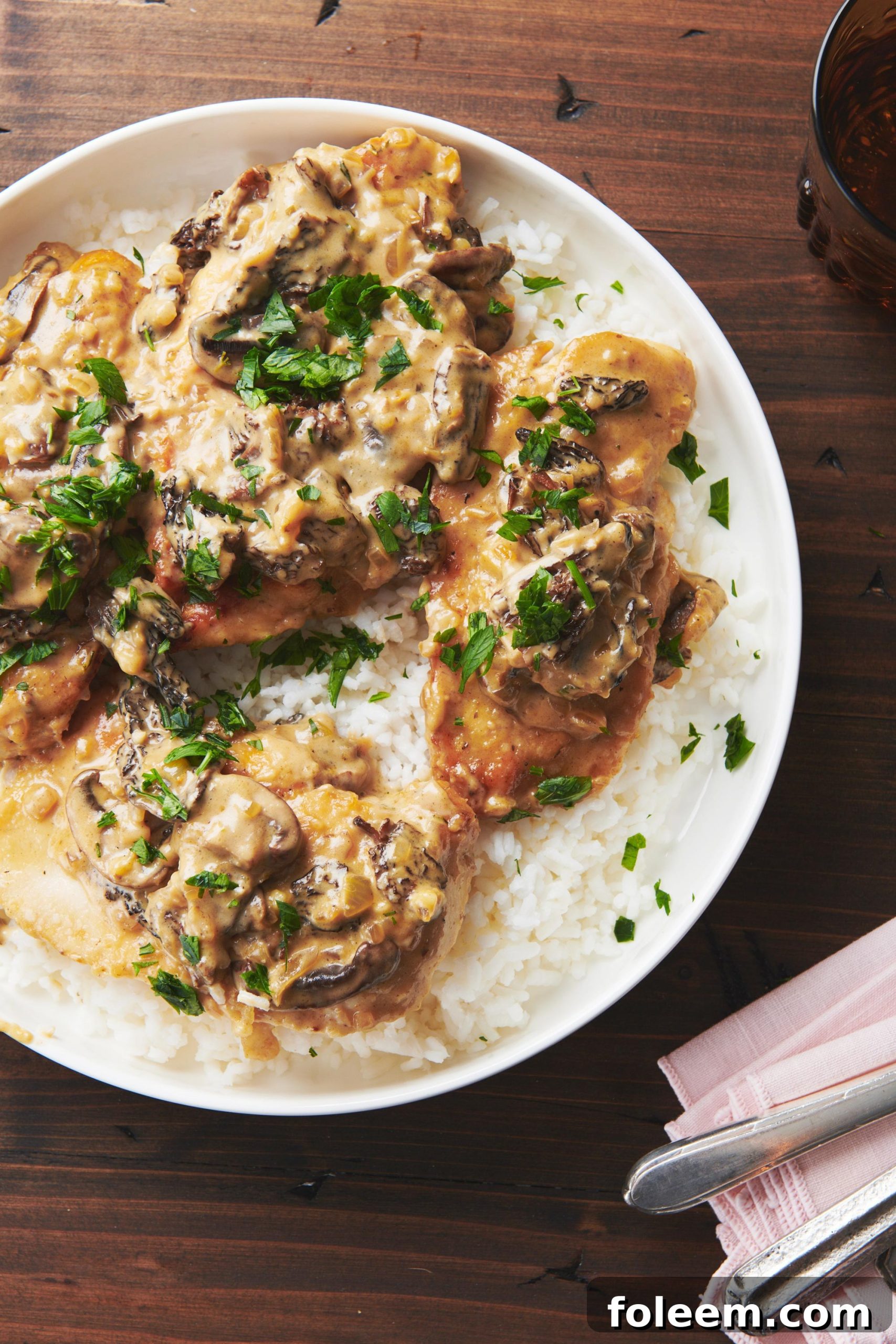 Parmesan Garlic Mushroom Chicken on white plate.