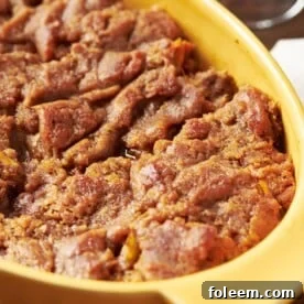 Yellow dish of Sweet Potato Casserole.