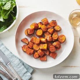 White plate of Butter-Roasted Sweet Potatoes