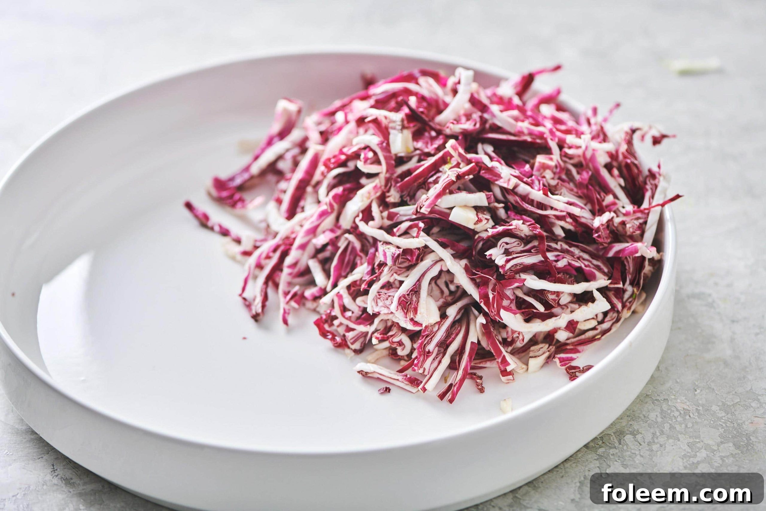 Slivered radicchio in a bowl.