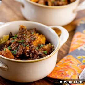 White, handled bowl of Barbecue Beer Beef Stew.