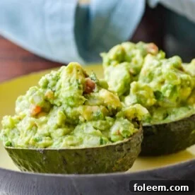 Guacamole piled high in avocado halves.
