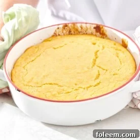 White cast iron pan of cornbread.