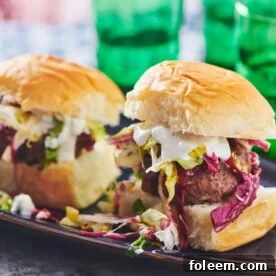 Chipotle Sliders on a dark blue plate.