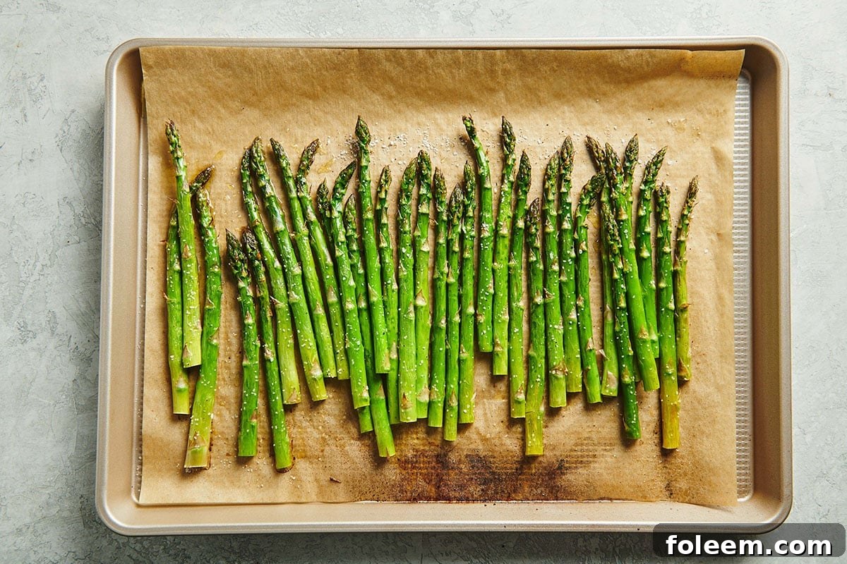 Roasted Asparagus on baking pan.