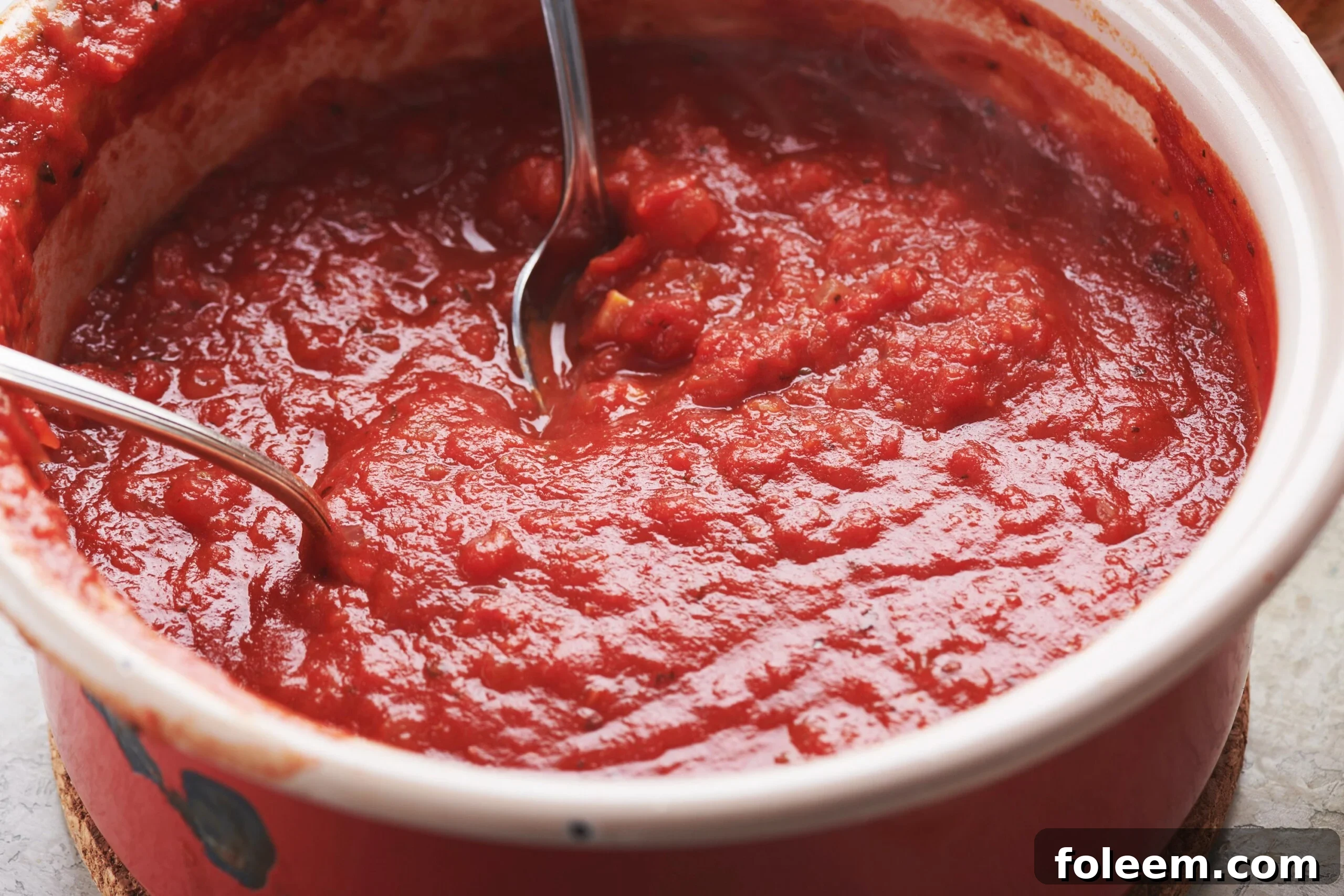 Tomato sauce cooking in pot for spaghetti