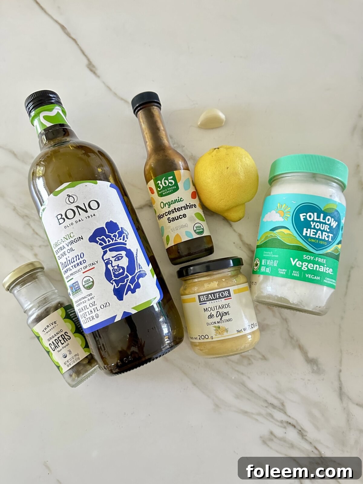 dressing ingredients on a white surface