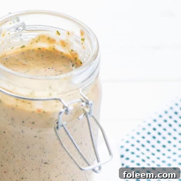 Jar filled with Roasted Red Pepper Basil Mayonnaise.