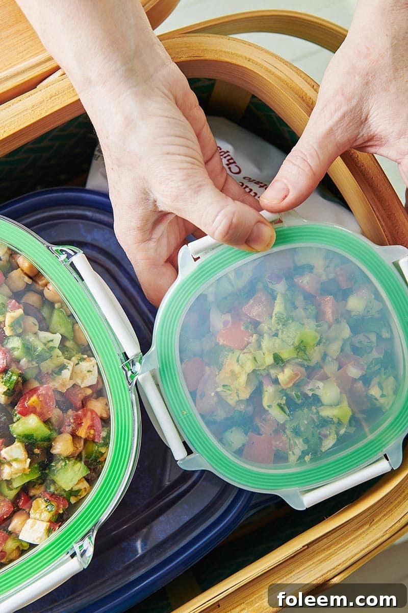 Person putting food containers into a basket.