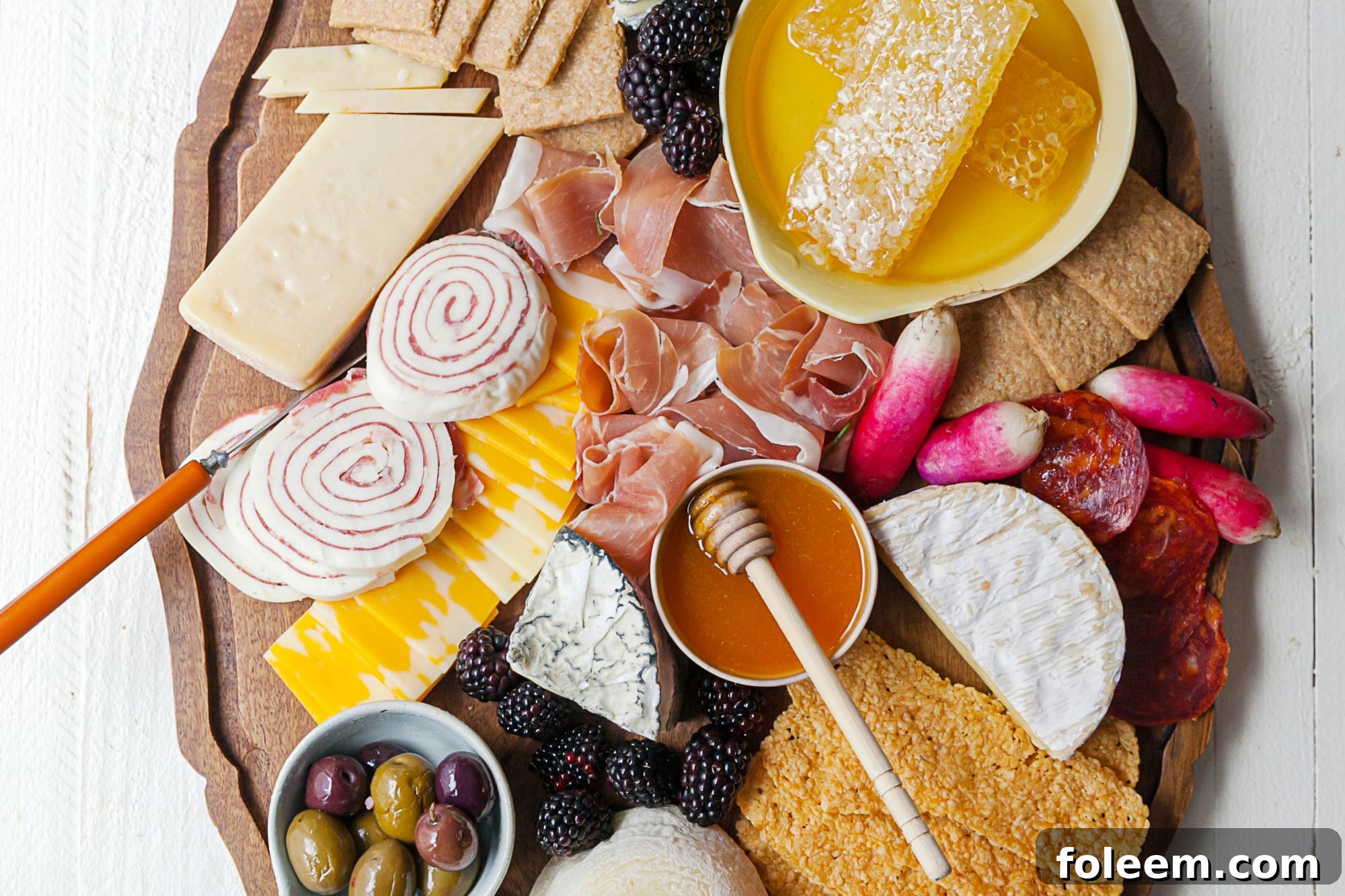 Cheeses and charcuterie on a Graze Board.