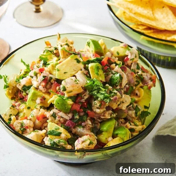 Glass bowl of colorful Shrimp Ceviche.