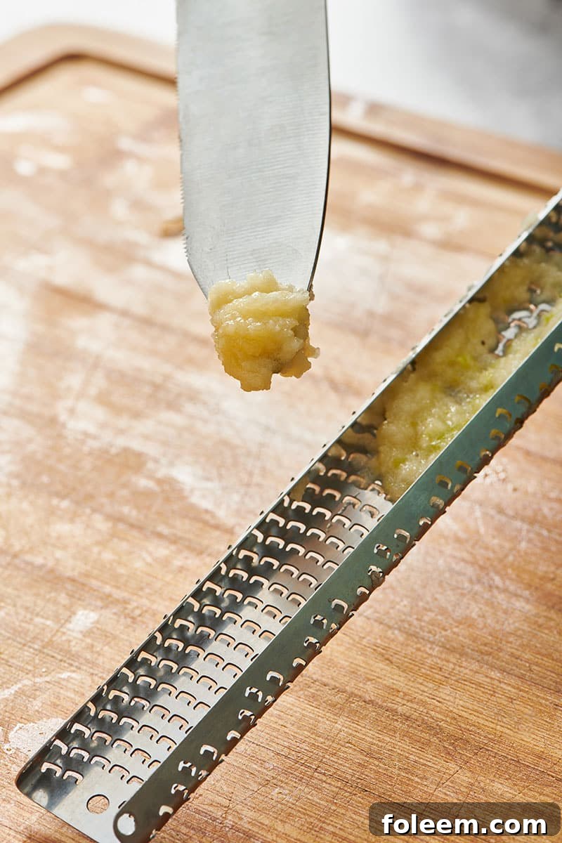 Freshly grated garlic on Microplane.
