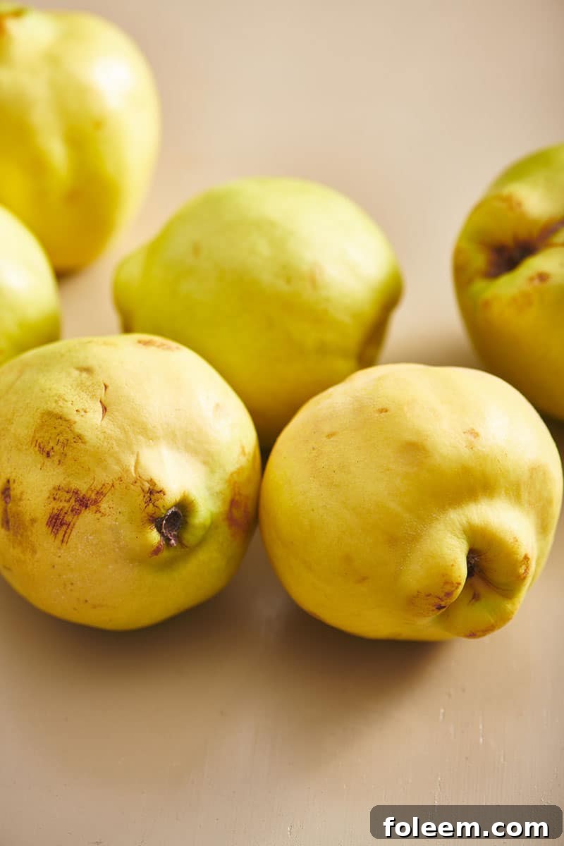 Fresh quince on table