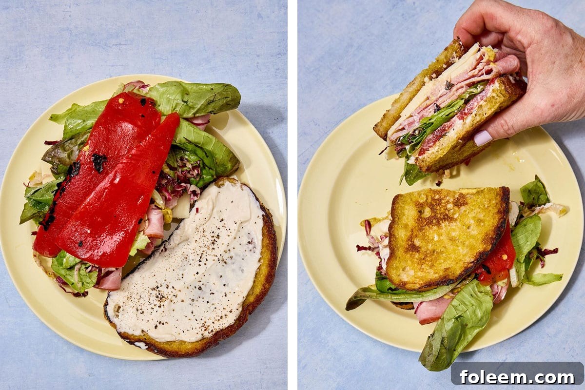 Making and eating sandwich with ham, lettuce, and roasted pepper.