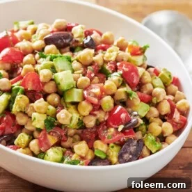 White bowl of chickpea salad.