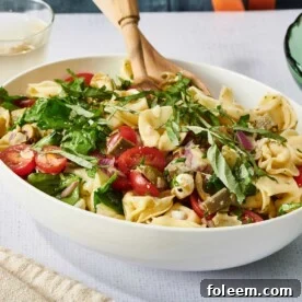 Tortellini Pasta Salad in white serving bowl.