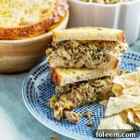 Italian Tuna Salad sandwiches on blue plate.