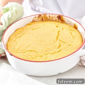 White cast iron pan of cornbread.